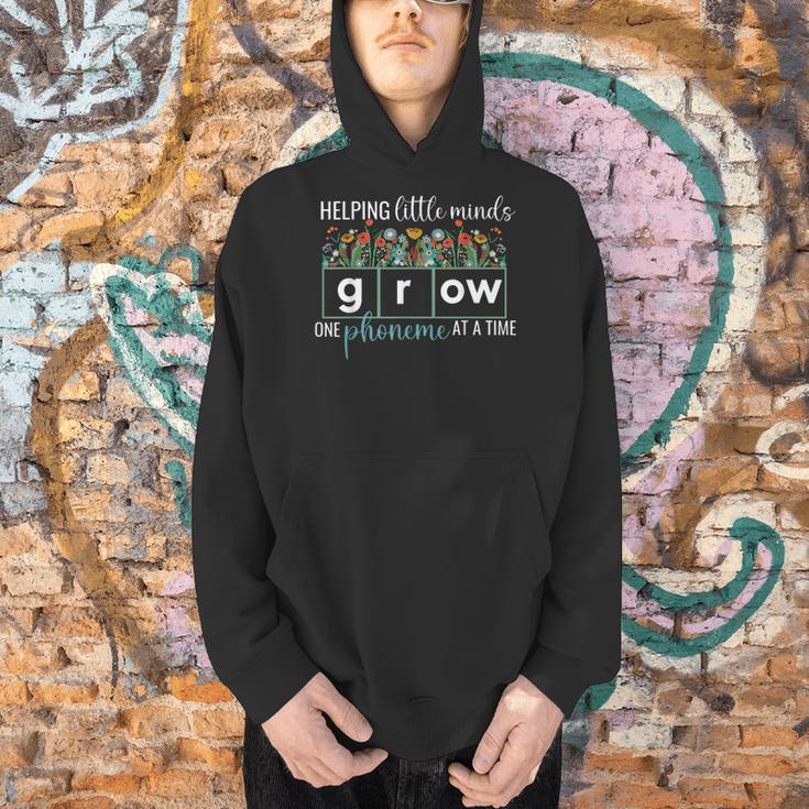 Helping Little Minds Grow One Phoneme At A Time Teacher Men Hoodie, gift for family, gift for coworker Helping Little Minds Grow One Phoneme At A Time Teacher Men Hoodie, gift for family, gift for coworker
