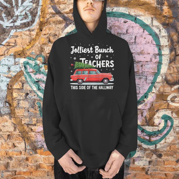 Jolliest Bunch Of Teachers This Side Of The Hallway Xmas PJ Men Hoodie, gift for family, gift for coworker Jolliest Bunch Of Teachers This Side Of The Hallway Xmas PJ Men Hoodie, gift for family, gift for coworker