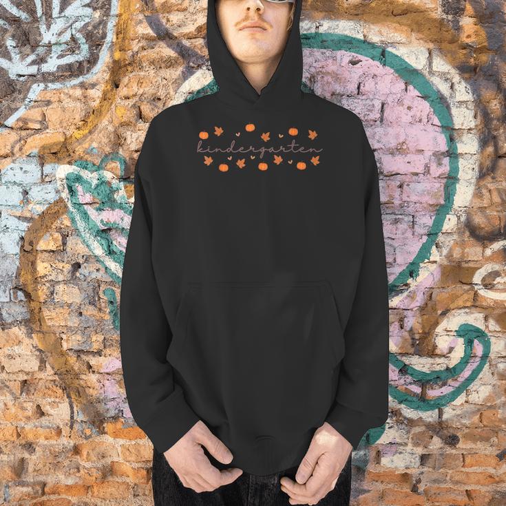 Kindergarten Teacher Pumpkin Autumn Leaves Kinder Team Fall Men Hoodie, gift for family, gift for coworker