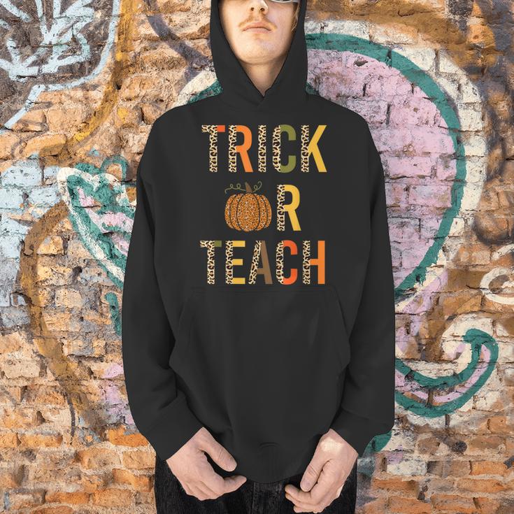 Leopard Trick Or Teach Halloween Teacher Costume Women Men Hoodie, gift for family, gift for coworker
