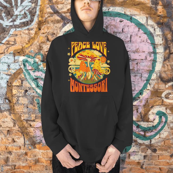 Montessori School Montessori Teacher Peace Love Montessori For Men Women Men Hoodie, gift for family, gift for coworker Montessori School Montessori Teacher Peace Love Montessori For Men Women Men Hoodie, gift for family, gift for coworker