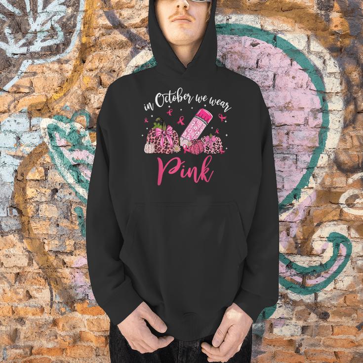In October We Wear Pink Apple Teacher Daisy Breast Cancer Men Hoodie, gift for family, gift for coworker