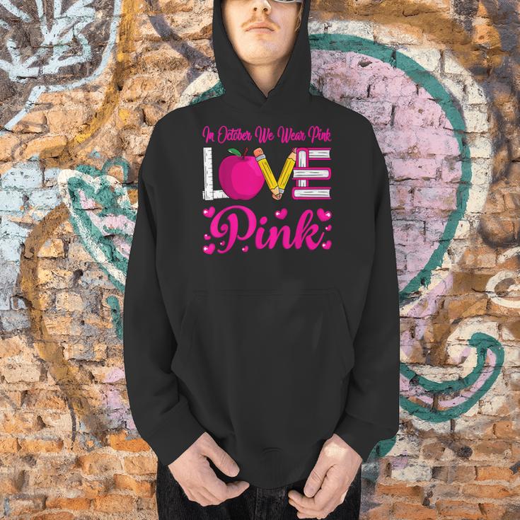 In October We Wear Pink Love Teacher Breast Cancer Awareness Men Hoodie, gift for family, gift for coworker In October We Wear Pink Love Teacher Breast Cancer Awareness Men Hoodie, gift for family, gift for coworker