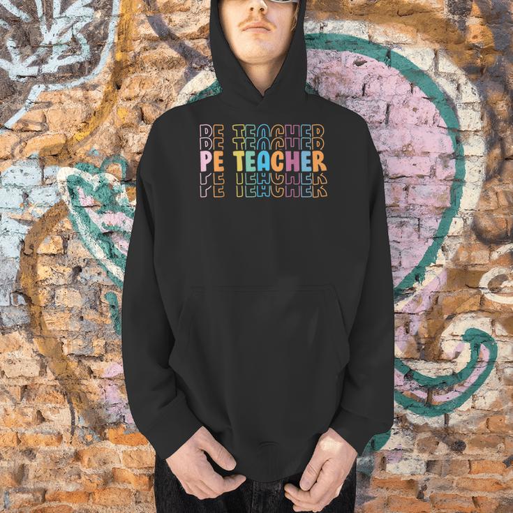PE Teacher Vintage Retro Groovy Physical Education Teacher Men Hoodie, Pe Teacher Hoodies, Groovy Teacher Hoodies, gift for family, gift for coworker