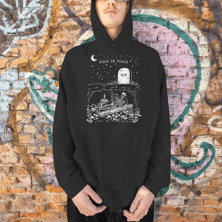 Read In Peace Skeleton Halloween Book Reading Spooky Teacher Men Hoodie, gift for family, gift for coworker Read In Peace Skeleton Halloween Book Reading Spooky Teacher Men Hoodie, gift for family, gift for coworker