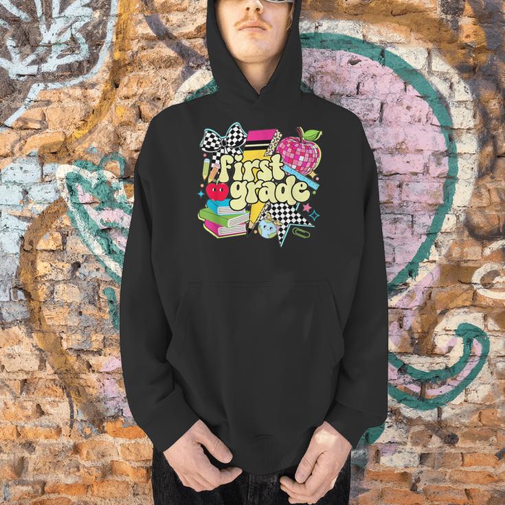 Retro First Grade Teacher Disco Ball Coquette Back To School Men Hoodie, First Grade Teacher Hoodies, gift for family, gift for coworker Retro First Grade Teacher Disco Ball Coquette Back To School Men Hoodie, First Grade Teacher Hoodies, gift for family, gift for coworker