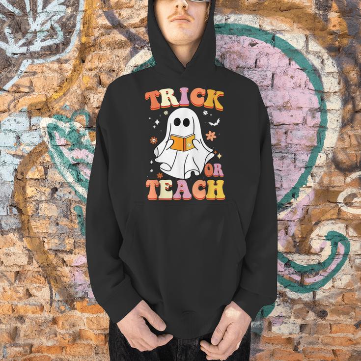 Retro Vintage Groovy Trick Or Teach Teacher Halloween For Men Women Kids Men Hoodie, Groovy Teacher Hoodies, gift for family, gift for coworker