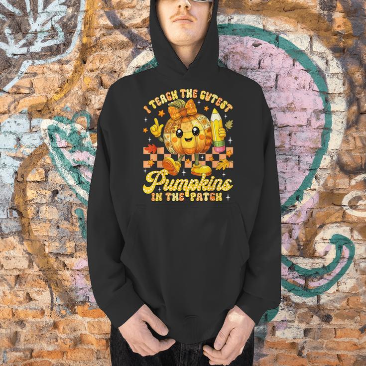 I Teach The Cutest Pumpkins In The Patch Teacher Halloween Men Hoodie, gift for family, gift for coworker