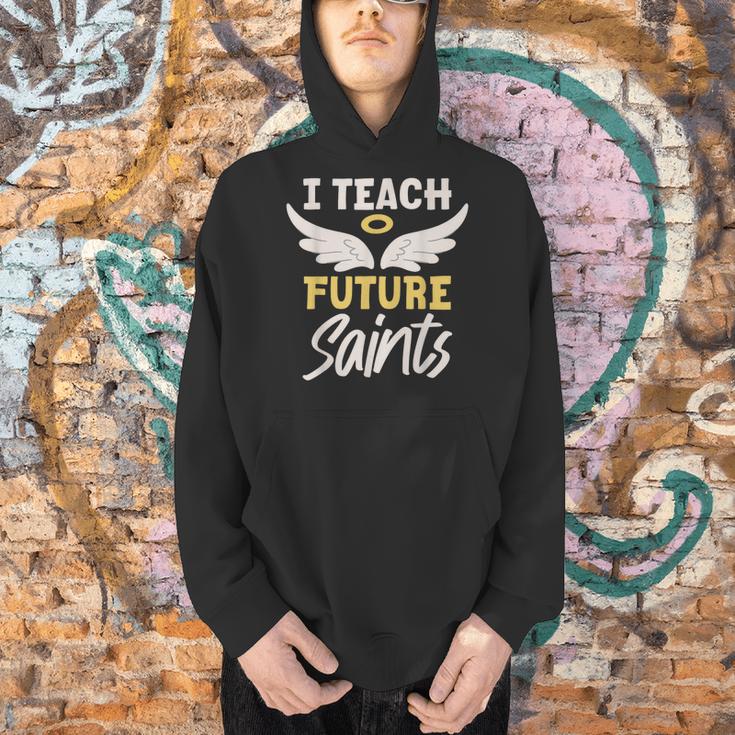 I Teach Future Saints Catholic Educator Teacher Men Hoodie, Future Teacher Hoodies, gift for family, gift for coworker I Teach Future Saints Catholic Educator Teacher Men Hoodie, Future Teacher Hoodies, gift for family, gift for coworker