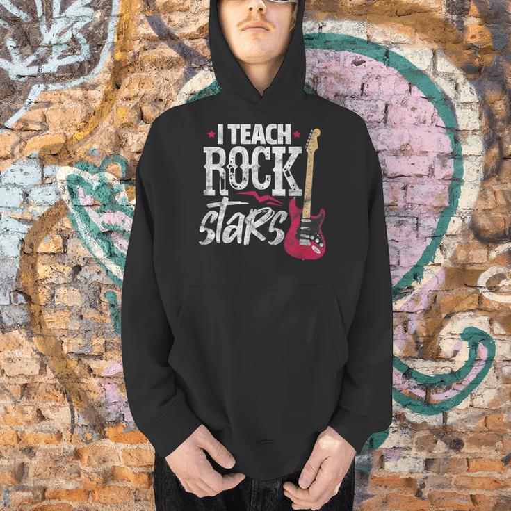 I Teach Rock Stars Music Teacher Guitar Player Men Hoodie, gift for family, gift for coworker I Teach Rock Stars Music Teacher Guitar Player Men Hoodie, gift for family, gift for coworker
