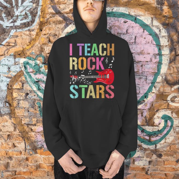 I Teach Rockstars Band Vibes Teacher Rocks My Music Teaching Men Hoodie, gift for family, gift for coworker I Teach Rockstars Band Vibes Teacher Rocks My Music Teaching Men Hoodie, gift for family, gift for coworker