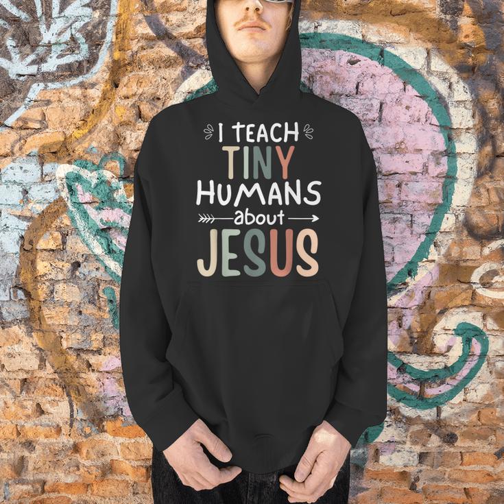 I Teach Tiny Humans About Jesus Teacher Sunday School Faith Men Hoodie, gift for family, gift for coworker I Teach Tiny Humans About Jesus Teacher Sunday School Faith Men Hoodie, gift for family, gift for coworker
