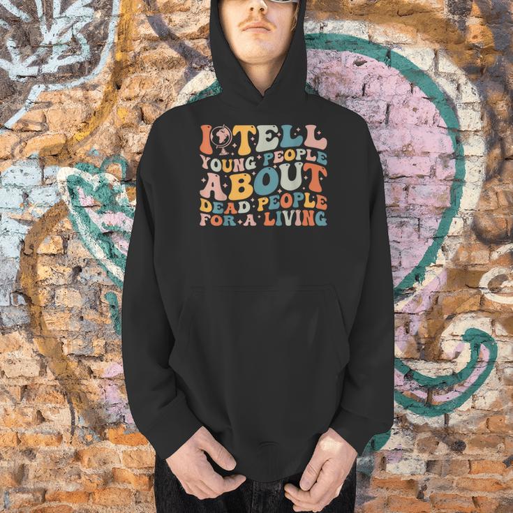 I Tell Young People About Dead People Groovy History Teacher Men Hoodie, History Teacher Hoodies, Groovy Teacher Hoodies, gift for family, gift for coworker I Tell Young People About Dead People Groovy History Teacher Men Hoodie, History Teacher Hoodies, Groovy Teacher Hoodies, gift for family, gift for coworker