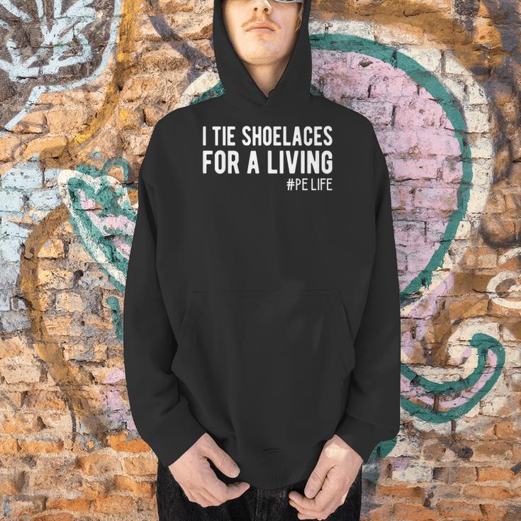 I Tie Shoelaces For a Living Elementary PE Teacher Men Hoodie, Pe Teacher Hoodies, gift for family, gift for coworker