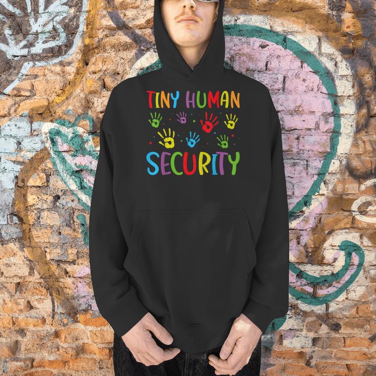 Tiny Human Security Preschool Childcare Teacher Babysitters Men Hoodie, gift for family, gift for coworker