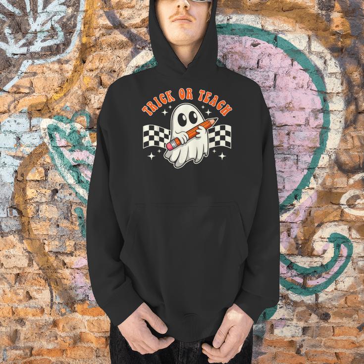Trick Or Teach Groovy Retro Ghost Halloween Teacher Kids Men Hoodie, Groovy Teacher Hoodies, gift for family, gift for coworker