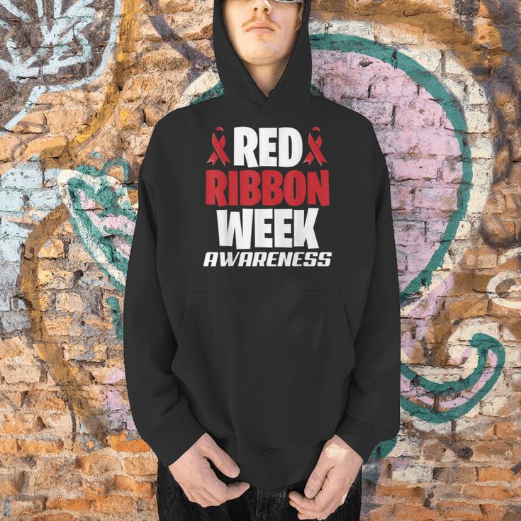 We Wear Red For Red Ribbon Week Awareness Mothers Teachers Men Hoodie, gift for family, gift for coworker We Wear Red For Red Ribbon Week Awareness Mothers Teachers Men Hoodie, gift for family, gift for coworker