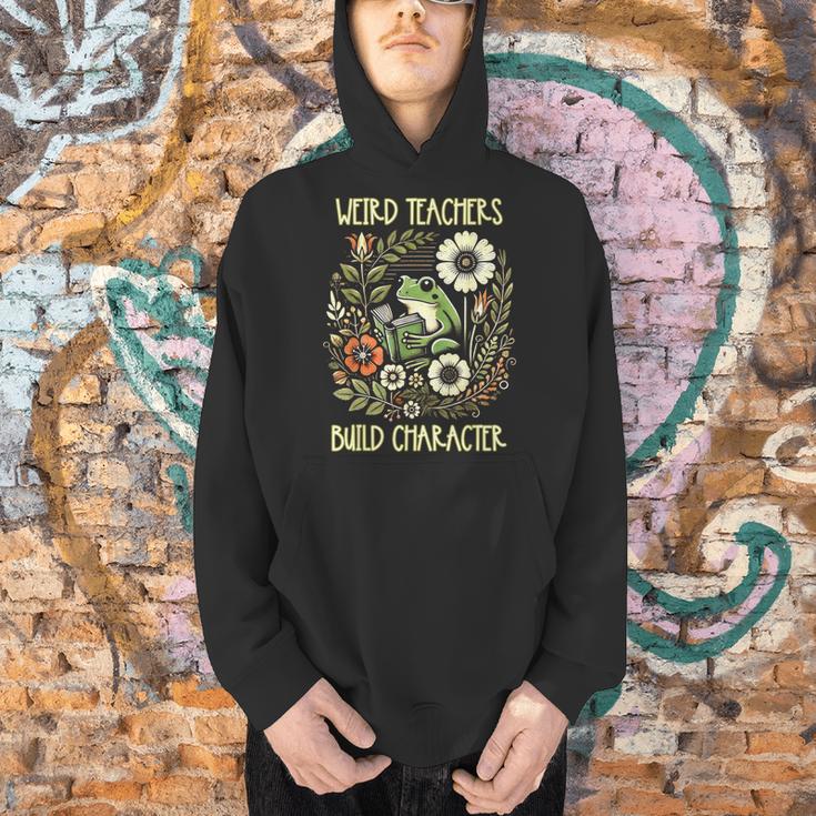 Weird Teachers Build Character Frog Reading Book Librarian Men Hoodie, gift for family, gift for coworker Weird Teachers Build Character Frog Reading Book Librarian Men Hoodie, gift for family, gift for coworker