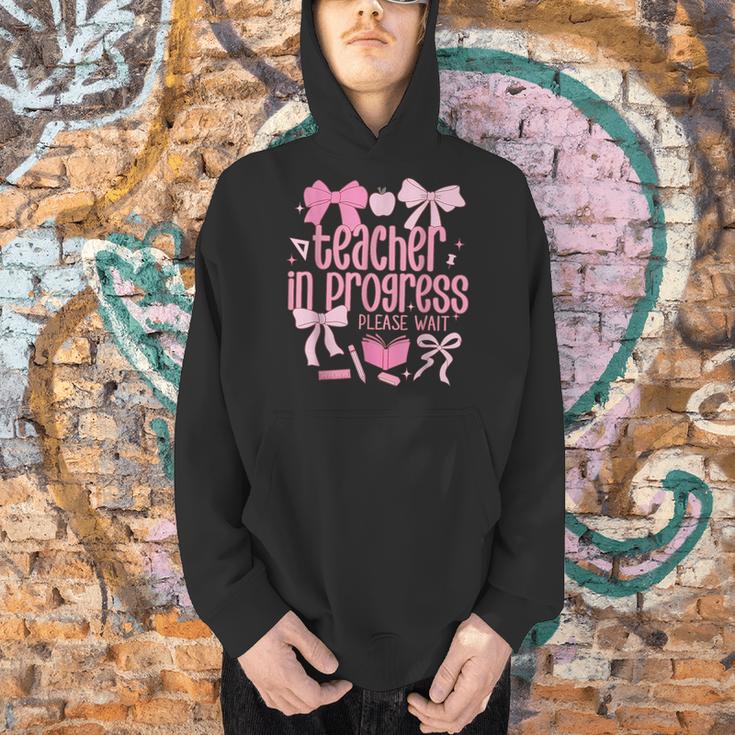Women Teacher In Progress Coquette Pink Bow Future Teacher Men Hoodie, Future Teacher Hoodies, gift for family, gift for coworker