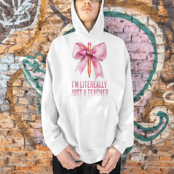I'm Literally Just a Teacher Pencil Coquette Bow School Men Hoodie, gift for family, gift for coworker I'm Literally Just a Teacher Pencil Coquette Bow School Men Hoodie, gift for family, gift for coworker