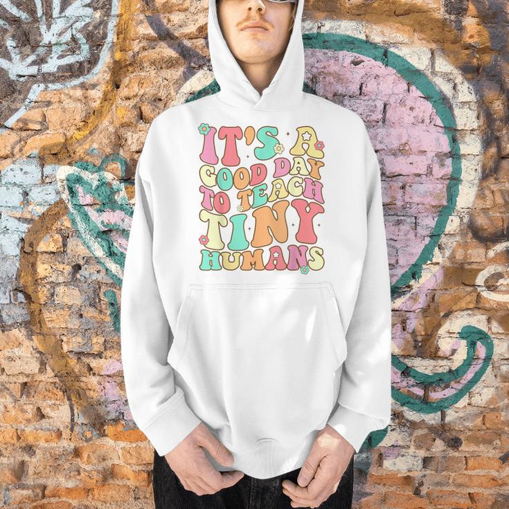 It's A Good Day To Teach Tiny Humans Teacher Teaching Men Hoodie, gift for family, gift for coworker It's A Good Day To Teach Tiny Humans Teacher Teaching Men Hoodie, gift for family, gift for coworker