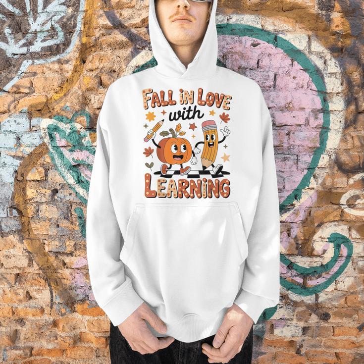 Retro Fall In Love With Learning Autumn Pumpkin Teacher Kids Men Hoodie, gift for family, gift for coworker