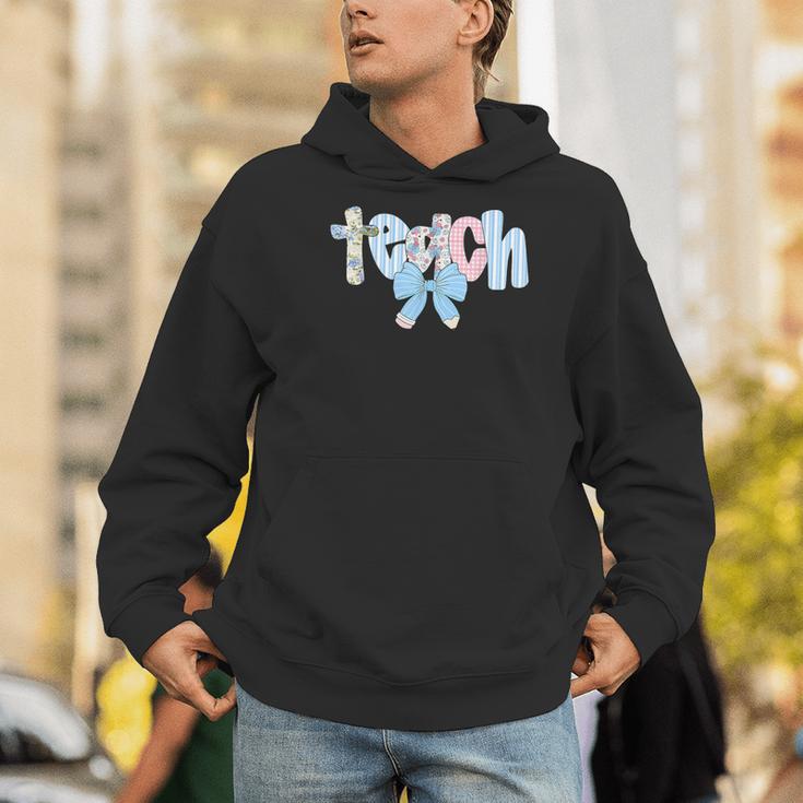 Coquette Bow Teach Teacher Happy First Day Back To School Men Hoodie, funny gift