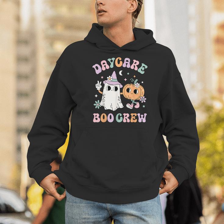 Daycare Boo Crew Groovy Halloween Floral Ghost Kid Teacher Men Hoodie, Groovy Teacher Hoodies, funny gift Daycare Boo Crew Groovy Halloween Floral Ghost Kid Teacher Men Hoodie, Groovy Teacher Hoodies, funny gift