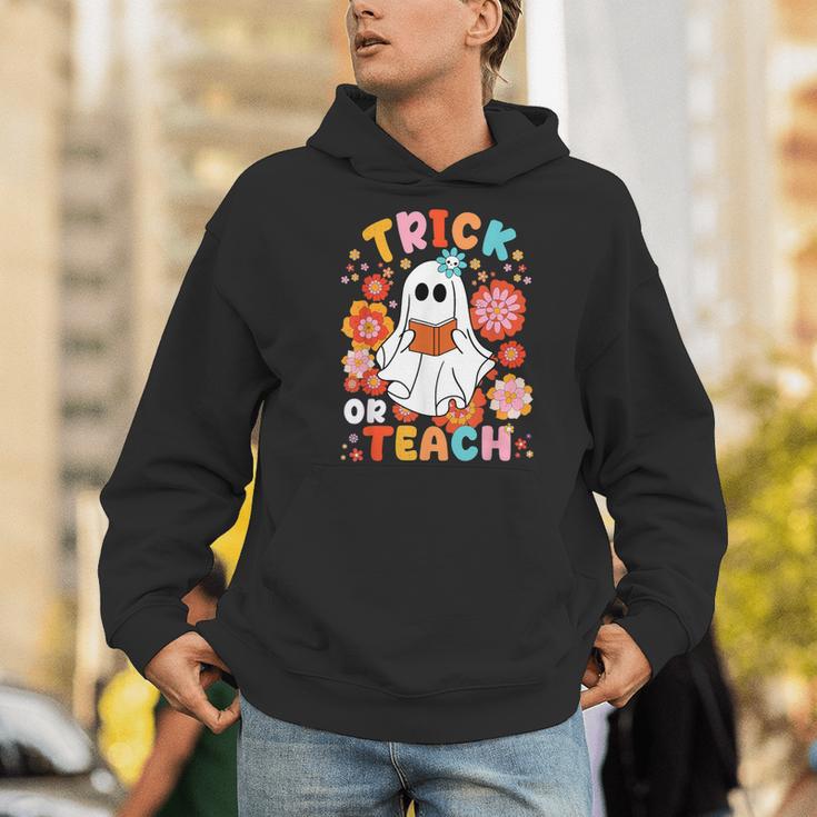 Groovy Halloween Trick Or Teach Retro Floral Ghost Teacher For Men Women Kids Men Hoodie, Groovy Teacher Hoodies, funny gift