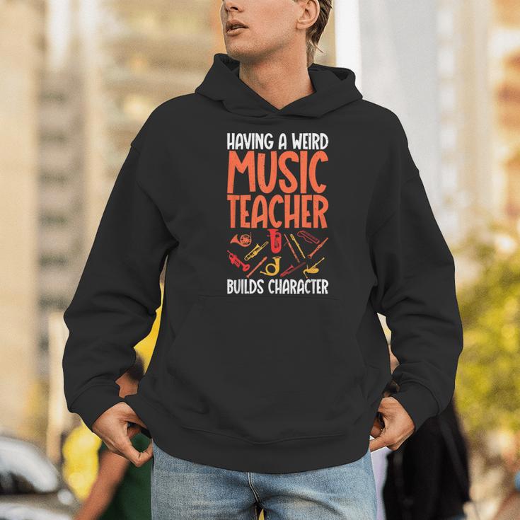 Having a Weird Music Teacher Builds Character Music Teacher Men Hoodie, funny gift