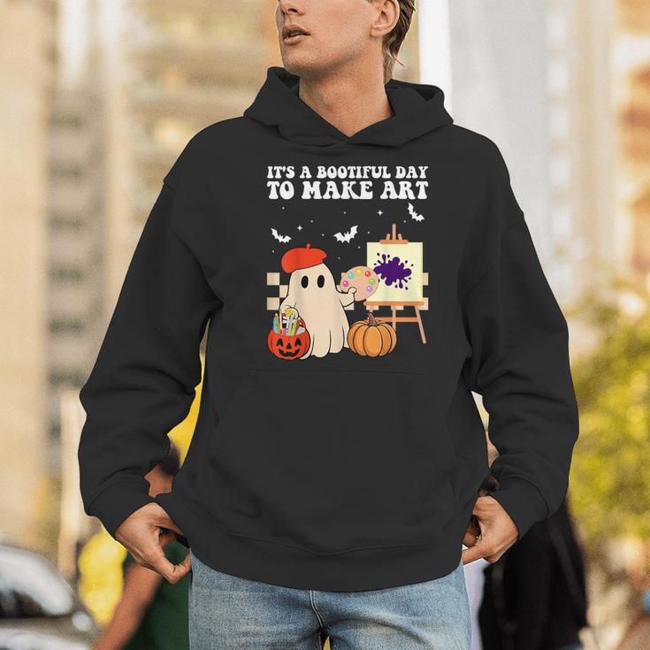 It's A Bootiful Day To Make Art Groovy Art Teacher Halloween Men Hoodie, Groovy Teacher Hoodies, funny gift It's A Bootiful Day To Make Art Groovy Art Teacher Halloween Men Hoodie, Groovy Teacher Hoodies, funny gift