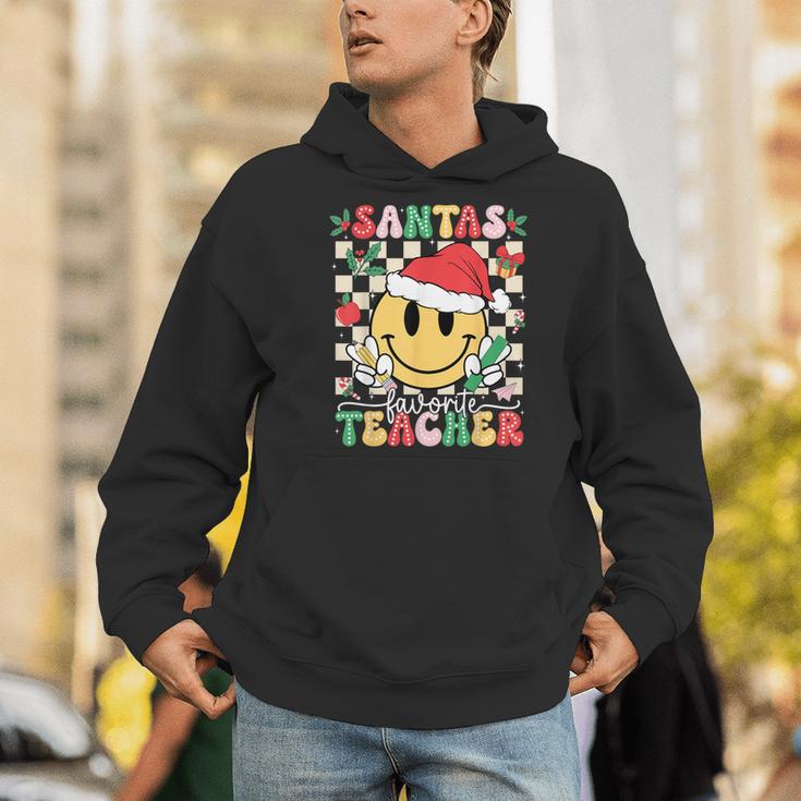 Santas Favorite Teacher Retro Groovy Smile Face Christmas Men Hoodie, Groovy Teacher Hoodies, funny gift Santas Favorite Teacher Retro Groovy Smile Face Christmas Men Hoodie, Groovy Teacher Hoodies, funny gift