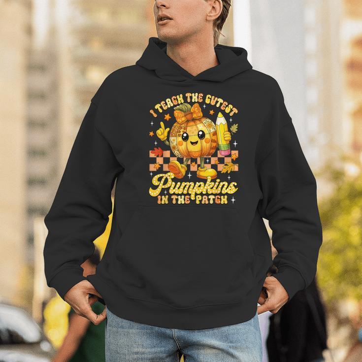 I Teach The Cutest Pumpkins In The Patch Teacher Halloween Men Hoodie, funny gift