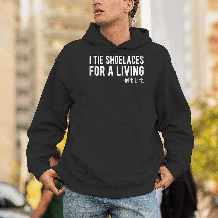 I Tie Shoelaces For a Living Elementary PE Teacher Men Hoodie, Pe Teacher Hoodies, funny gift