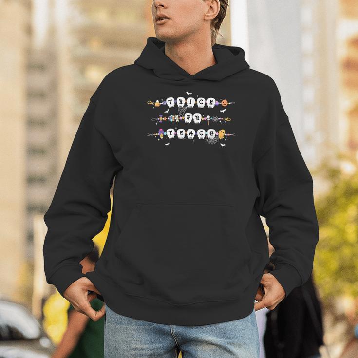 Trick Or Teach Spooky Teacher Happy Halloween Bracelet Men Hoodie, funny gift Trick Or Teach Spooky Teacher Happy Halloween Bracelet Men Hoodie, funny gift