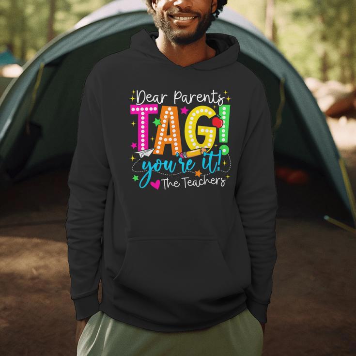 Dear Parents Tag You'Re It Love Teachers Last Day Of School Men Hoodie, novelty gifts, funny gifts