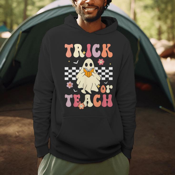 Groovy Teacher Halloween Retro Trick Or Teach Floral Ghost Men Hoodie, novelty gifts, funny gifts