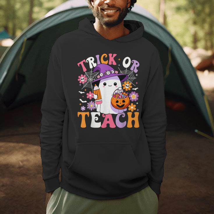 Trick Or Teach Groovy Teacher Ghost Halloween Teacher Men Hoodie, novelty gifts, funny gifts Trick Or Teach Groovy Teacher Ghost Halloween Teacher Men Hoodie, novelty gifts, funny gifts