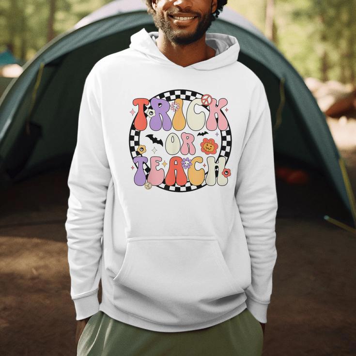 Trick Or Teach Retro Groovy Halloween Teacher Men Hoodie, novelty gifts, funny gifts