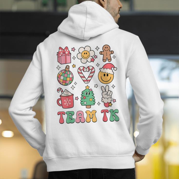 Team TK Teacher Christmas Groovy Smile Face Girl Boy Kid TK Men's Hoodie Back Print, Groovy Teacher Hoodies, funny gift Team TK Teacher Christmas Groovy Smile Face Girl Boy Kid TK Men's Hoodie Back Print, Groovy Teacher Hoodies, funny gift