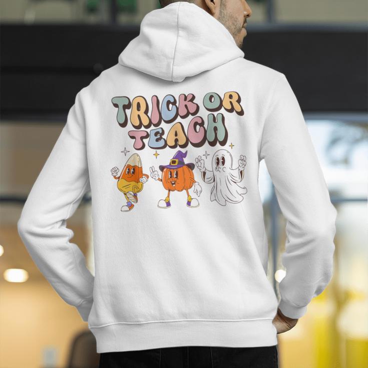 Trick Or Teach Candy Corn Pumpkin Ghost Teacher Men's Hoodie Back Print, funny gift Trick Or Teach Candy Corn Pumpkin Ghost Teacher Men's Hoodie Back Print, funny gift