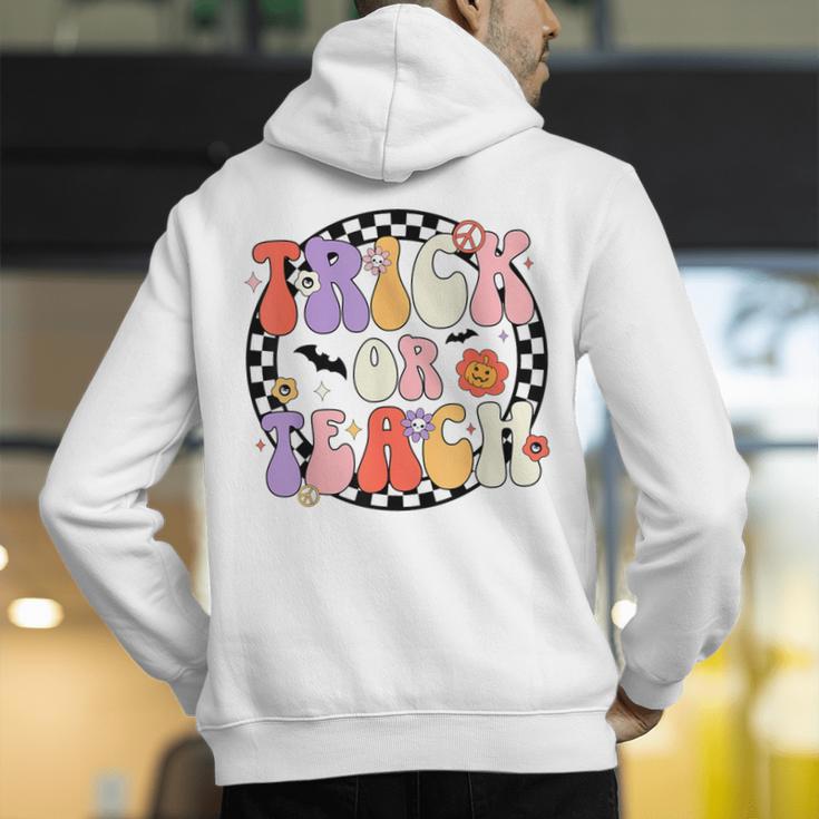 Trick Or Teach Retro Groovy Halloween Teacher Men's Hoodie Back Print, Groovy Teacher Hoodies, funny gift