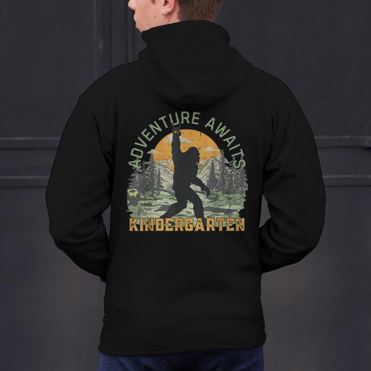 Adventure Awaits Bigfoot Teacher Kindergarten Back To School Men's Hoodie Back Print, gift for family, gift for coworker Adventure Awaits Bigfoot Teacher Kindergarten Back To School Men's Hoodie Back Print, gift for family, gift for coworker