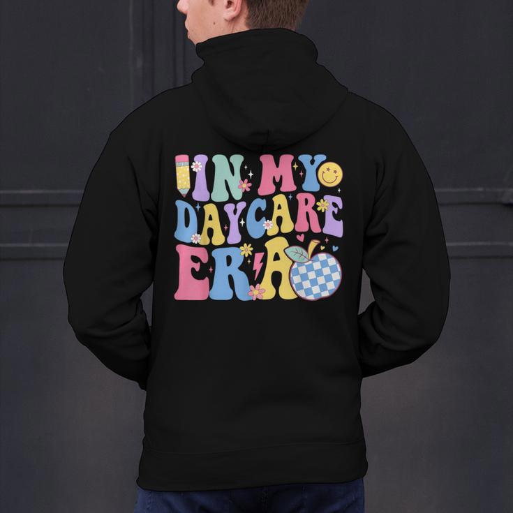 In My Daycare Era Groovy Teacher Daycare First Day Of School Men's Hoodie Back Print, Groovy Teacher Hoodies, gift for family, gift for coworker In My Daycare Era Groovy Teacher Daycare First Day Of School Men's Hoodie Back Print, Groovy Teacher Hoodies, gift for family, gift for coworker