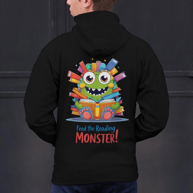Feed The Reading Monster Halloween Teacher Men's Hoodie Back Print, gift for family, gift for coworker Feed The Reading Monster Halloween Teacher Men's Hoodie Back Print, gift for family, gift for coworker