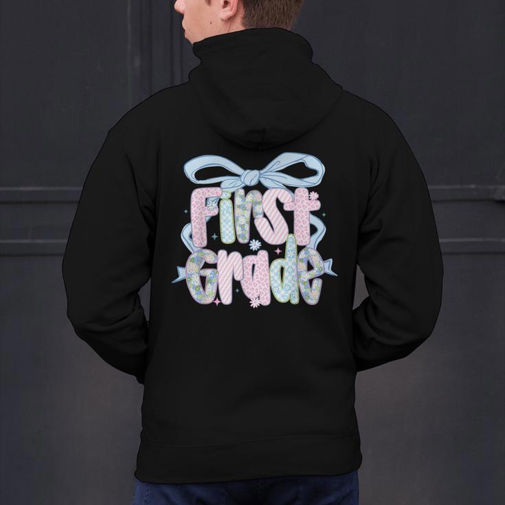 First Grade Coquette Bow Girls Teacher Team 1st Grade Squad Men's Hoodie Back Print, First Grade Teacher Hoodies, gift for family, gift for coworker First Grade Coquette Bow Girls Teacher Team 1st Grade Squad Men's Hoodie Back Print, First Grade Teacher Hoodies, gift for family, gift for coworker