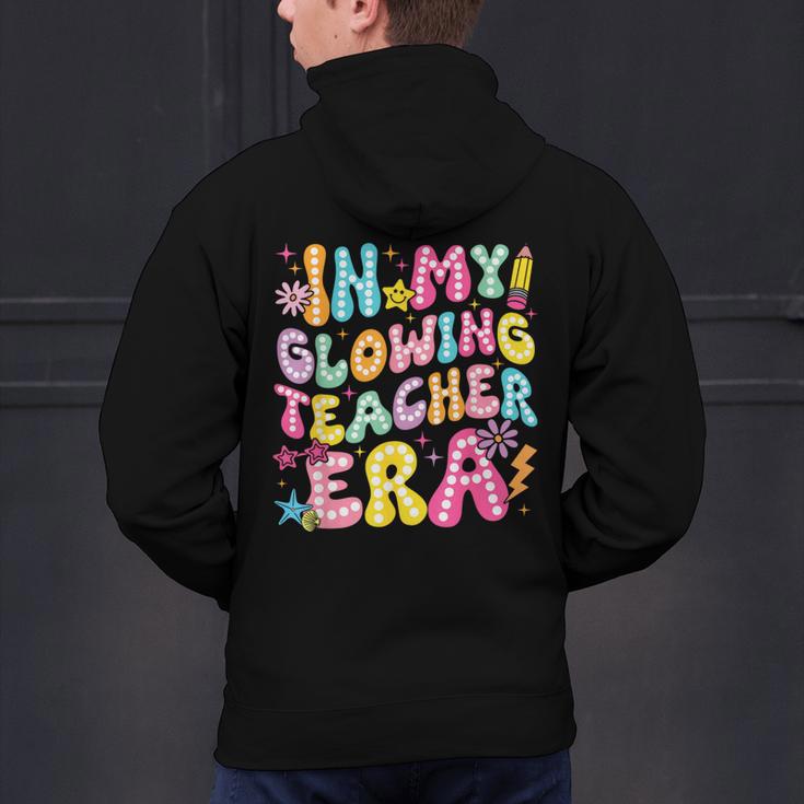 In My Glowing Teacher Era Teaching Back To School Men's Hoodie Back Print, gift for family, gift for coworker In My Glowing Teacher Era Teaching Back To School Men's Hoodie Back Print, gift for family, gift for coworker