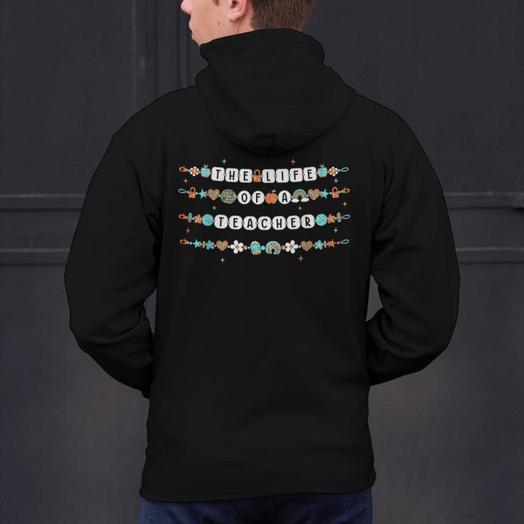 The Life Of A Teacher Friendship Bracelets Elementary School Men's Hoodie Back Print, gift for family, gift for coworker The Life Of A Teacher Friendship Bracelets Elementary School Men's Hoodie Back Print, gift for family, gift for coworker