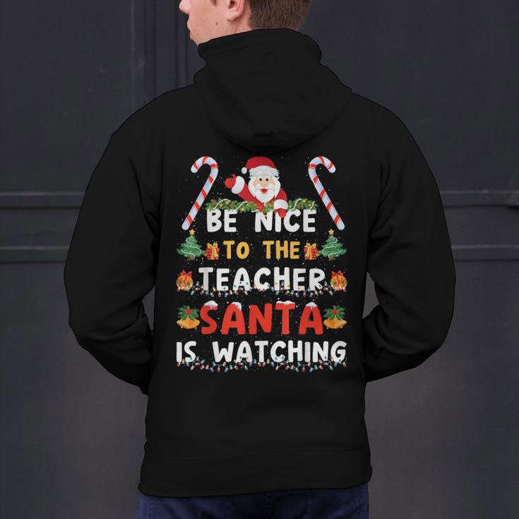 Be Nice To The Teacher Santa Is Watching Christmas Men's Hoodie Back Print, gift for family, gift for coworker Be Nice To The Teacher Santa Is Watching Christmas Men's Hoodie Back Print, gift for family, gift for coworker