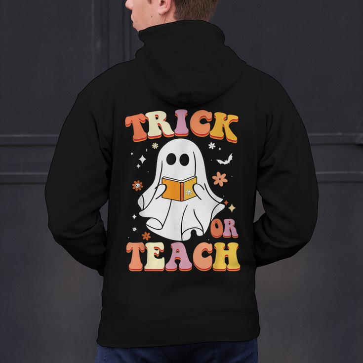 Retro Vintage Groovy Trick Or Teach Teacher Halloween For Men Women Kids Men's Hoodie Back Print, Groovy Teacher Hoodies, gift for family, gift for coworker Retro Vintage Groovy Trick Or Teach Teacher Halloween For Men Women Kids Men's Hoodie Back Print, Groovy Teacher Hoodies, gift for family, gift for coworker